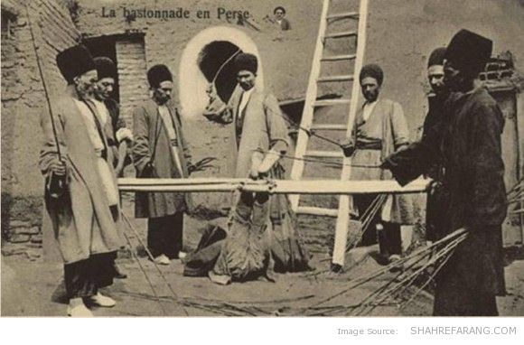 Falak whipping in Persia. Postcard, Early 20th Century.